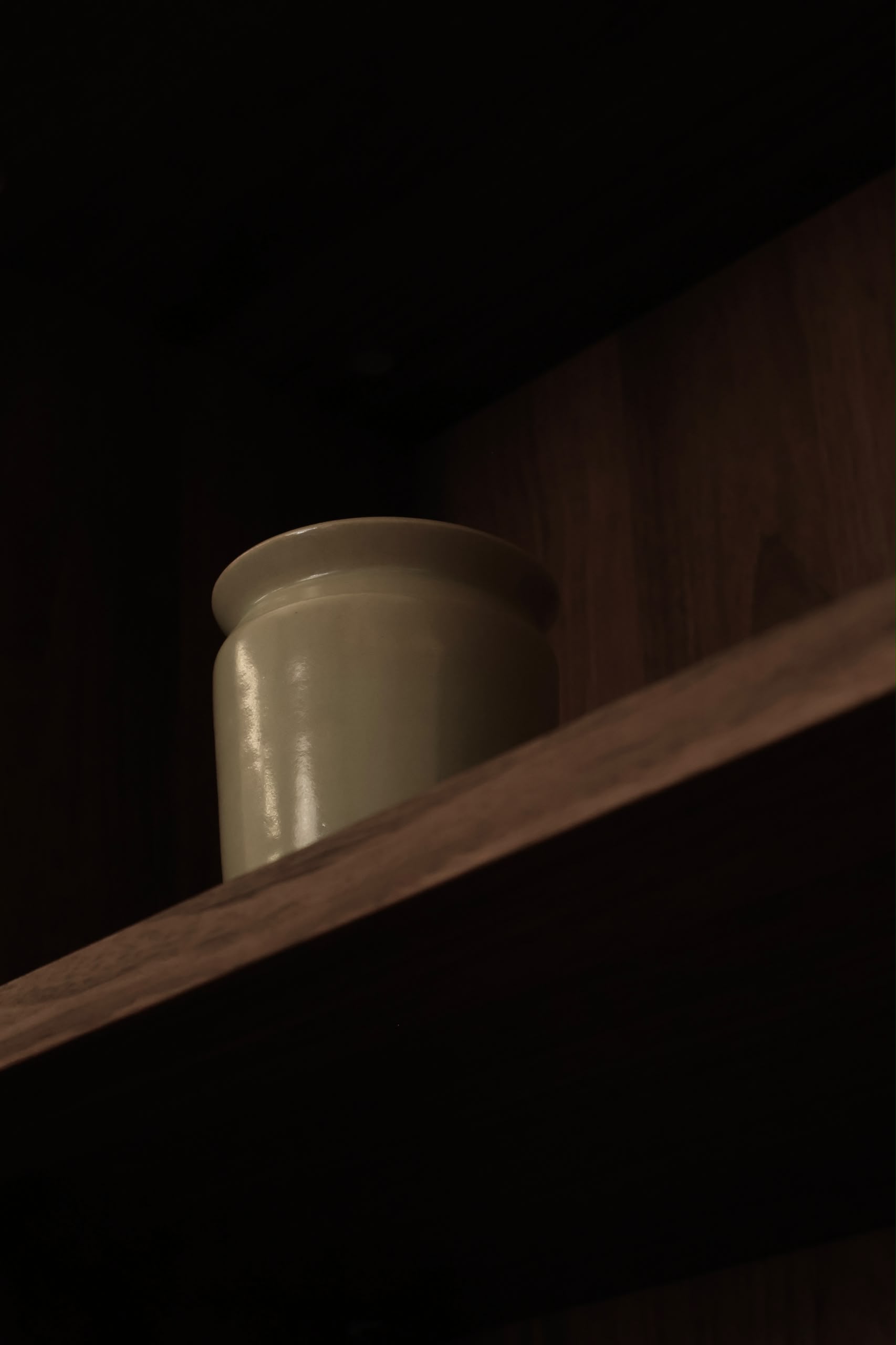 Small handmade ceramic cups and vases
